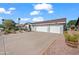 Well-maintained house with three-car garage and desert landscaping at 6715 S Lakeshore Dr, Tempe, AZ 85283
