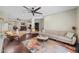 Spacious open-concept living area featuring hardwood floors and stylish furnishings at 6715 S Lakeshore Dr, Tempe, AZ 85283