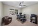 Office area featuring a ceiling fan, desk with chair, and view to outdoor space at 6715 S Lakeshore Dr, Tempe, AZ 85283