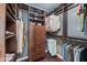 Walk-in closet with built-in shelving and drawers for organized storage of clothes and accessories at 6715 S Lakeshore Dr, Tempe, AZ 85283