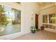 Welcoming entryway with tiled floor, a well-maintained exterior, and large windows at 7115 E Buena Terra Way, Paradise Valley, AZ 85253