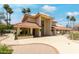 Attractive building with a red tile roof, beautiful landscaping, and a welcoming entrance at 7115 E Buena Terra Way, Paradise Valley, AZ 85253