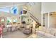 Open-concept living area with dining space, high ceilings, and comfortable seating at 7115 E Buena Terra Way, Paradise Valley, AZ 85253