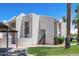 An exterior view of the apartments with palm trees at 7350 N Via Paseo Del Sur -- # N207, Scottsdale, AZ 85258