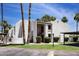 Charming condo building features stucco facade, covered parking, and well-maintained landscaping at 7350 N Via Paseo Del Sur -- # N207, Scottsdale, AZ 85258