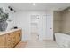 Modern bathroom boasts a soaking tub, walk-in shower, bright vanity, and modern decorative touches at 7409 E Pleasant Run, Scottsdale, AZ 85258