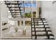 Unique staircase with decorative lighting and modern architectural design at 7409 E Pleasant Run, Scottsdale, AZ 85258