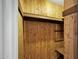 Walk-in closet with wood paneling for optimal storage and organization at 7632 E Bonita Dr, Scottsdale, AZ 85250
