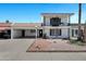 Charming two-story home with a well-maintained front yard and unique architectural details at 7632 E Bonita Dr, Scottsdale, AZ 85250
