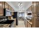 Traditional kitchen features granite countertops, stainless steel appliances, and wood cabinets at 7632 E Bonita Dr, Scottsdale, AZ 85250