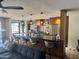 Modern kitchen boasts stainless appliances, sleek counters, pendant lighting, and an open layout for seamless entertaining at 7632 E Bonita Dr, Scottsdale, AZ 85250
