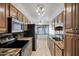 Well-lit kitchen with granite countertops, stainless steel appliances, and ample cabinet space at 7632 E Bonita Dr, Scottsdale, AZ 85250