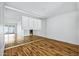 Cozy room with mirrored wall with shutter detail and wood flooring at 7632 E Bonita Dr, Scottsdale, AZ 85250