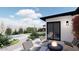 Modern backyard with a pool, fire pit, lounge chairs, and elegant landscaping perfect for outdoor entertaining at 8341 E Hubbell St, Scottsdale, AZ 85257