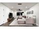 Cozy living room boasts plush seating, modern decor, and recessed lighting, creating an inviting and stylish space at 8341 E Hubbell St, Scottsdale, AZ 85257