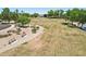 Community green space featuring benches, landscaping, and walking paths near a serene pond at 8664 W Yukon Dr, Peoria, AZ 85382
