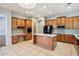 Well-equipped kitchen boasts stainless steel appliances and center island at 8664 W Yukon Dr, Peoria, AZ 85382