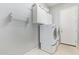 Functional laundry room with modern appliances and storage cabinets at 8664 W Yukon Dr, Peoria, AZ 85382