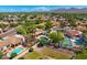 A well-planned desert community with lush landscaping, pools, and tennis courts at 10157 E San Salvador Dr, Scottsdale, AZ 85258