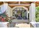 Grand entrance with a full glass door, and a view of the spacious living area, and abundant natural light at 10157 E San Salvador Dr, Scottsdale, AZ 85258