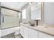 Modern bathroom featuring a glass shower, marble tile, a vessel sink, and chrome fixtures at 11260 N 92Nd St # 2054, Scottsdale, AZ 85260