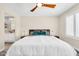 Beautiful primary bedroom featuring a ceiling fan and a view into the on-suite bathroom at 11260 N 92Nd St # 2054, Scottsdale, AZ 85260