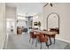 Bright dining room with a modern rustic table and an open floor plan at 11260 N 92Nd St # 2054, Scottsdale, AZ 85260