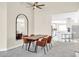 Open dining room showcases a rustic table and comfortable chairs at 11260 N 92Nd St # 2054, Scottsdale, AZ 85260