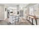 Bright kitchen featuring an island with breakfast bar and modern appliances at 11260 N 92Nd St # 2054, Scottsdale, AZ 85260