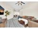 Spacious living room features modern decor, neutral paint, and grey wood flooring at 11260 N 92Nd St # 2054, Scottsdale, AZ 85260
