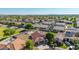 This home features a backyard pool, landscaping, and a two-car garage at 1443 N Poppy St, Casa Grande, AZ 85122