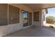 Back patio area with sliding glass doors and an outdoor view at 1443 N Poppy St, Casa Grande, AZ 85122