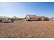 Expansive backyard featuring desert landscaping, providing a low-maintenance outdoor space at 1443 N Poppy St, Casa Grande, AZ 85122