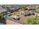 Aerial view showcasing the property's pool, gazebo, and desert landscaping at 1443 N Poppy St, Casa Grande, AZ 85122