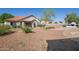 Spacious backyard with a barbecue area, pool, and a covered patio, perfect for outdoor gatherings at 1443 N Poppy St, Casa Grande, AZ 85122