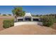 Outdoor barbecue area with a built-in grill, perfect for outdoor cooking and entertaining at 1443 N Poppy St, Casa Grande, AZ 85122