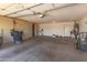 Spacious garage providing ample storage and parking with water heater at 1443 N Poppy St, Casa Grande, AZ 85122
