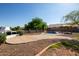 Inviting backyard pool area with a covered pergola, ideal for relaxation and outdoor entertainment at 1443 N Poppy St, Casa Grande, AZ 85122