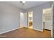 Open bedroom view with ensuite bathroom and walk-in closet at 15803 W Almeria Rd, Goodyear, AZ 85395