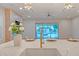Bright kitchen featuring stainless steel appliances, a large island, and views of the inviting outdoor space at 15803 W Almeria Rd, Goodyear, AZ 85395