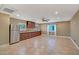 Expansive kitchenette area with stainless steel appliances, ample cabinetry, and tile flooring at 15803 W Almeria Rd, Goodyear, AZ 85395