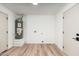 Spacious basement featuring modern wood flooring and a hot water heater at 1810 W Orchid Ln, Phoenix, AZ 85021