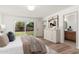 Bright bedroom with a sliding glass door and a view of the backyard at 1810 W Orchid Ln, Phoenix, AZ 85021