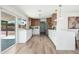 Modern kitchen features quartz countertops, white cabinets, and stainless steel appliances at 1810 W Orchid Ln, Phoenix, AZ 85021