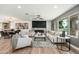Inviting living space featuring modern decor, fireplace, and an open layout perfect for entertaining at 1810 W Orchid Ln, Phoenix, AZ 85021