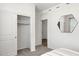 Bright bedroom featuring a closet with sliding doors and neutral carpet and paint at 18356 W Gray Fox Trl, Wittmann, AZ 85361