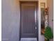 Stylish front door with modern design, secure lock, and welcoming decor at 20121 N 76Th St # 2021, Scottsdale, AZ 85255