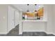 Kitchen boasting wooden cabinets, stainless steel appliances, white countertops, and stone tile flooring at 20121 N 76Th St # 2021, Scottsdale, AZ 85255