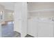 Laundry room with a new washer and dryer and easy access to other rooms at 20121 N 76Th St # 2021, Scottsdale, AZ 85255