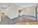 Inviting living room featuring open access to the kitchen, neutral colors, and ceramic tile flooring throughout at 20121 N 76Th St # 2021, Scottsdale, AZ 85255